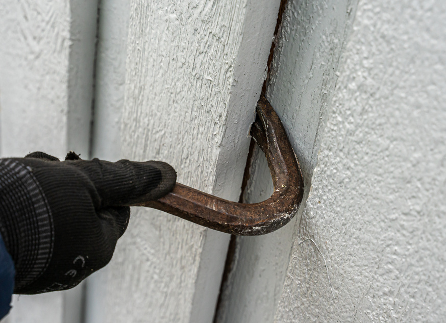 Crowbar Used to  Break Down the Wooden Wall